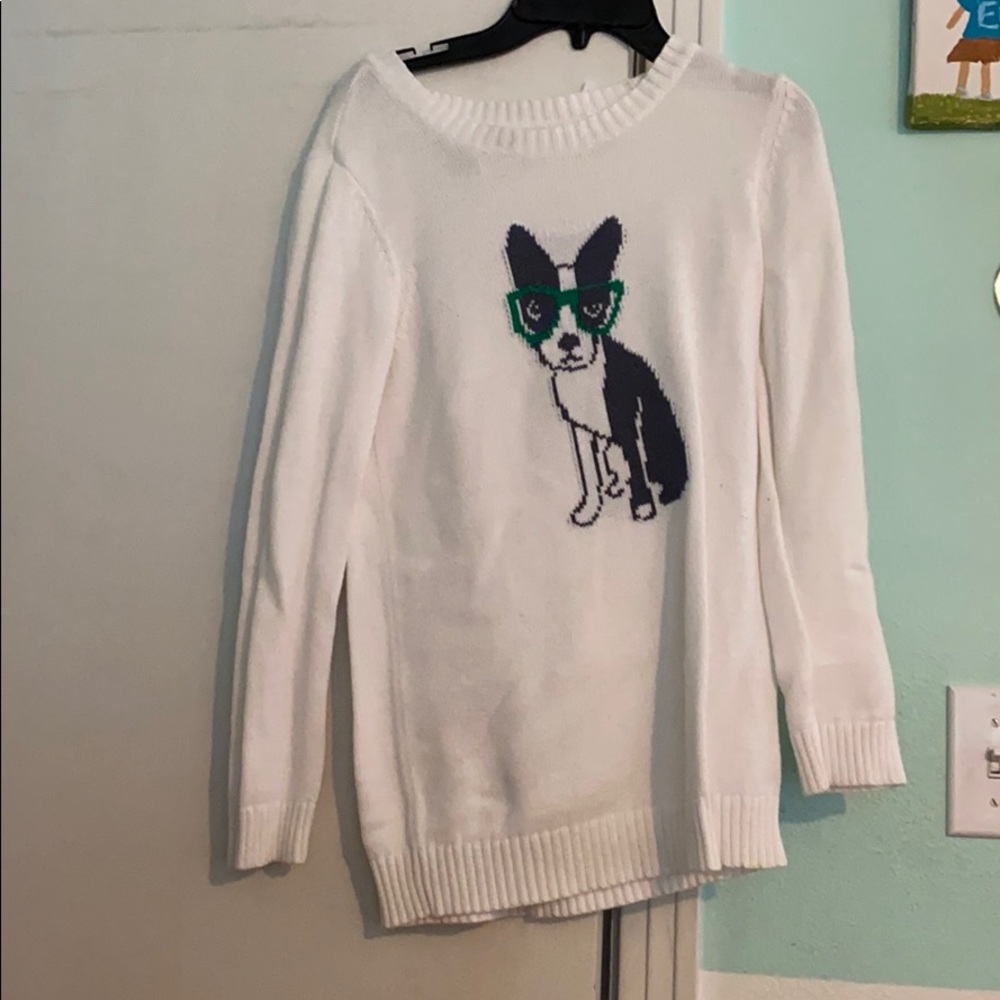 White sweater with dog